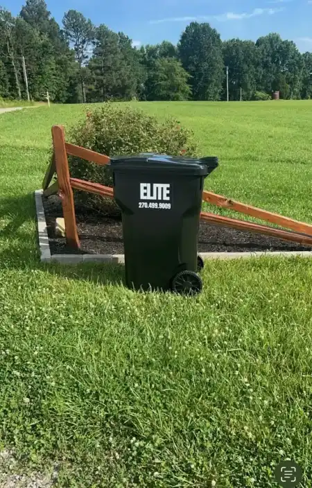 Elite Waste Management residential bin with company branding